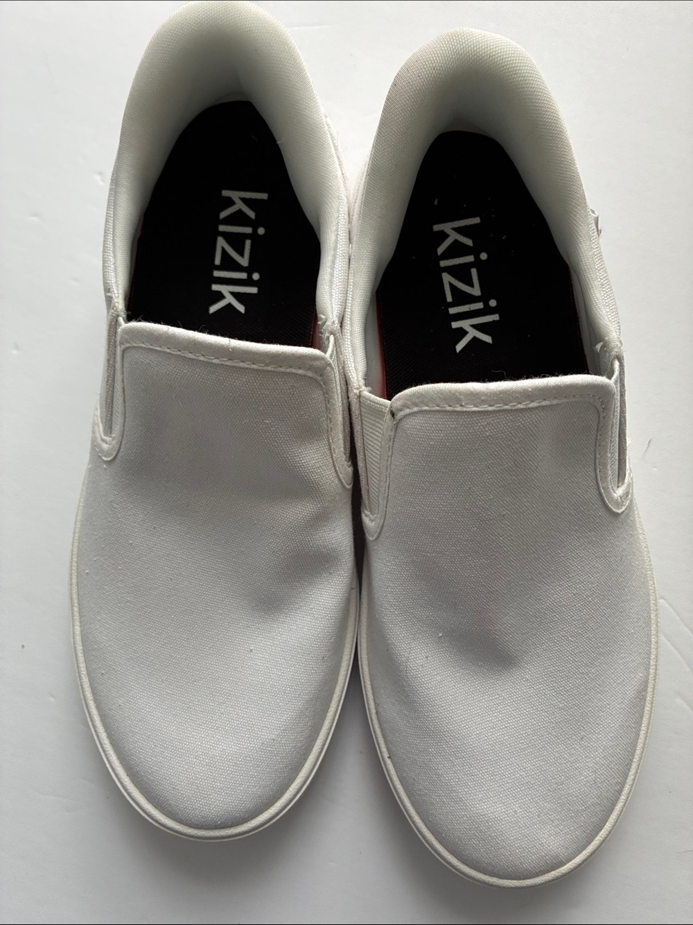 Kizik White Slip-On Canvas Sneakers in excellent condition,size 6.5 wide Women’s